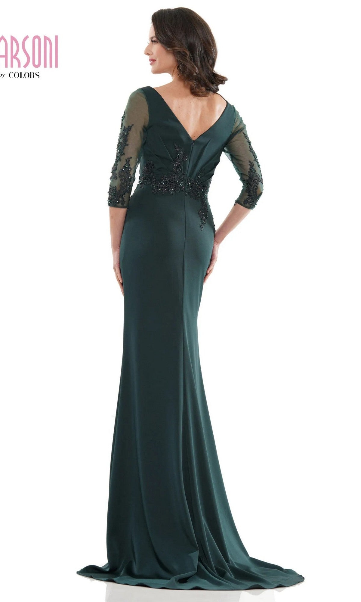 A woman is shown from the back in the Marsoni MV1145 long formal dress, which features sheer three-quarter sleeves and beaded embellishments.